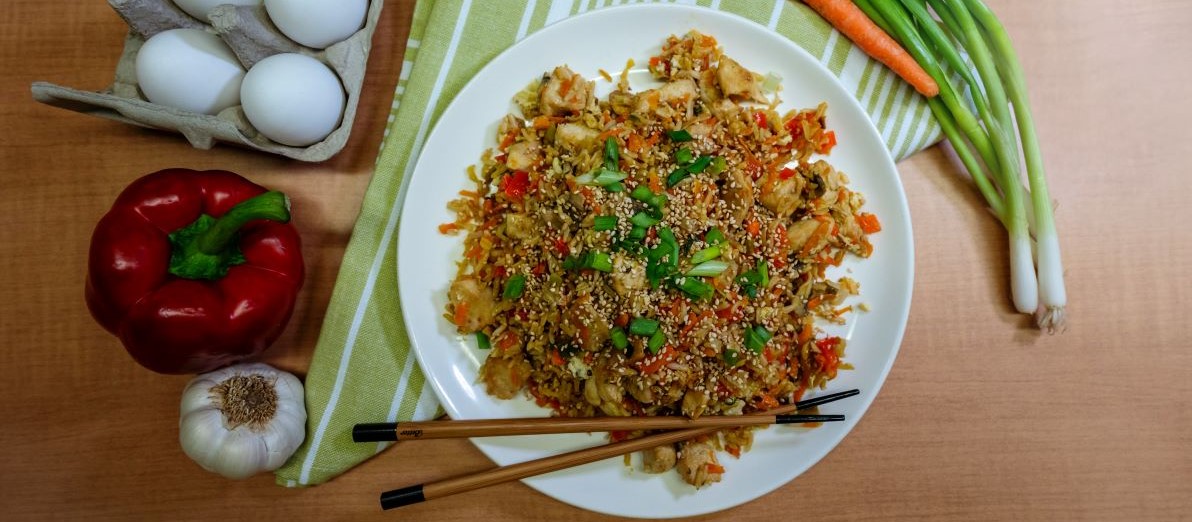 A photo of a chicken fried rice dish